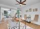 Bright office space with hardwood floors, large window, ceiling fan, and contemporary decor with mirror at 1050 N Lafayette St # 408, Denver, CO 80218