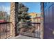 Private balcony with brick pillars and view at 17497 Nature Walk Trl # 101, Parker, CO 80134