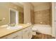 Clean bathroom, featuring a bathtub, shower, and vanity with granite countertop at 17497 Nature Walk Trl # 101, Parker, CO 80134