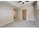 Bedroom with carpet, large closet, and access to bathroom at 17497 Nature Walk Trl # 101, Parker, CO 80134