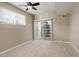 Bedroom with sliding door to balcony at 17497 Nature Walk Trl # 101, Parker, CO 80134