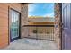 Private patio with metal railings, offering an outdoor space at 17497 Nature Walk Trl # 101, Parker, CO 80134