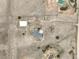 Top-down aerial shot of property featuring the home, garage, and surrounding bare land at 2845 Cherry Way, Parker, CO 80138