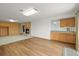 Spacious finished basement with fireplace, bar sink, wood paneling, and easy access to outside at 2845 Cherry Way, Parker, CO 80138