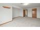Spacious bedroom features neutral carpet, white walls, and wood trim at 2845 Cherry Way, Parker, CO 80138