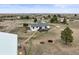 Property aerial view showing home, garage, fire pit, and open landscape at 2845 Cherry Way, Parker, CO 80138
