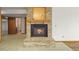 Cozy brick fireplace with hearth is in the finished basement at 2845 Cherry Way, Parker, CO 80138