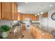 Spacious kitchen with granite countertops, stainless steel appliances, and a large center island at 2845 Cherry Way, Parker, CO 80138