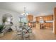 Bright eat-in kitchen with modern finishes, ample cabinet space, and stainless steel appliances at 2845 Cherry Way, Parker, CO 80138