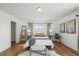 Comfortable main bedroom with wood floors, a walk-in closet, and a well-coordinated decor at 2845 Cherry Way, Parker, CO 80138