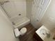 Functional bathroom features a tub with shower, a toilet, and a vanity at 707 W 96Th Ave # 9, Thornton, CO 80260