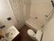 Bathroom featuring a tub with shower, toilet, and a vanity with basin sink at 707 W 96Th Ave # 9, Thornton, CO 80260