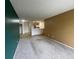 Open living area with view to kitchen and entrance, ready for personalization at 707 W 96Th Ave # 9, Thornton, CO 80260
