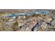 Aerial view of the property in a neighborhood with a lake nearby, showcasing the community's location and features at 5155 W 68Th Ave # 5, Westminster, CO 80030