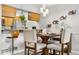 Modern dining room featuring modern chandelier lighting and wine rack at 5155 W 68Th Ave # 5, Westminster, CO 80030