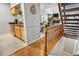 Hallway with an entry to the kitchen on one side, and living room and stairs straight ahead at 5155 W 68Th Ave # 5, Westminster, CO 80030