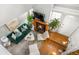 Bright living room featuring a fireplace, a green couch, and hardwood floors at 5155 W 68Th Ave # 5, Westminster, CO 80030