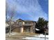 Two-story house with attached garage, landscaping, and a spacious front yard at 5416 S Gray St, Littleton, CO 80123