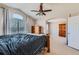 Main bedroom with high ceiling and large windows at 5416 S Gray St, Littleton, CO 80123