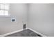 Laundry room features tile floors, neutral walls, a window, and utility hookups at 1011 White Leaf Cir, Castle Rock, CO 80108