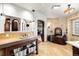 Elegant bathroom featuring stone accent wall with fireplace, bronze tub and a vessel sink at 1 Canon Pl, Greenwood Village, CO 80111