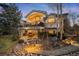 This multi-story house has balconies and patios for enjoying the outdoors at 1 Canon Pl, Greenwood Village, CO 80111