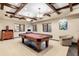 Spacious game room with coffered ceilings features a billiards table and classic furnishings at 1 Canon Pl, Greenwood Village, CO 80111