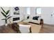 Bright and cozy living room with a fireplace, contemporary decor, and lots of natural light at 2857 S Pancratia St, Denver, CO 80236