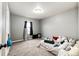 Comfortable bedroom, neutral color scheme, carpeted floors, and closet at 1824 Asoka St, Strasburg, CO 80136