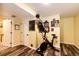 Exercise room with space for bike and fitness equipment for convenient workouts in a dedicated area at 1824 Asoka St, Strasburg, CO 80136