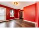 The room has a door leading to an outside deck at 1824 Asoka St, Strasburg, CO 80136