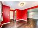 The room has multiple doorways leading to different areas at 1824 Asoka St, Strasburg, CO 80136