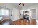 Modern kitchen featuring stainless steel appliances, white cabinets, and a ceiling fan for added comfort at 1137 Colorado Blvd, Denver, CO 80206