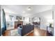 Open living space with a fireplace, built-in shelving, and seamless access to the dining area at 1137 Colorado Blvd, Denver, CO 80206
