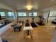 Spacious gym with hardwood floors, mirrored wall and views of the outdoor landscape at 24226 Currant Dr, Golden, CO 80401