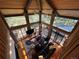 Overhead view of open concept living room with wood ceilings and floors, and bright natural light at 24226 Currant Dr, Golden, CO 80401