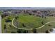 An aerial view highlights a park with walking trails and open green spaces, creating an inviting neighborhood gathering spot at 2949 Vivian St, Wheat Ridge, CO 80215
