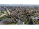 An aerial view of the neighborhood showcases mature trees, sidewalks and quiet streets creating a peaceful residential atmosphere at 2949 Vivian St, Wheat Ridge, CO 80215