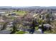Overhead view showcases this home's peaceful neighborhood with mature trees, green lawns, and convenient street access at 2949 Vivian St, Wheat Ridge, CO 80215