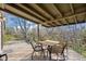 The back deck features outdoor seating on the well maintained deck at 2949 Vivian St, Wheat Ridge, CO 80215