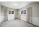 Bedroom featuring natural light, neutral paint, carpeting, and window views at 2949 Vivian St, Wheat Ridge, CO 80215