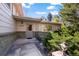 Charming front entrance featuring a covered porch, brick accents, and neat landscaping at 2949 Vivian St, Wheat Ridge, CO 80215