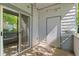 Cozy balcony with string lights, tile floors, and sliding glass doors providing ample natural light at 8055 W Eastman Pl # 104, Lakewood, CO 80227