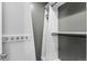 Walk-in closet featuring built-in shelving and rod for ample storage at 8055 W Eastman Pl # 104, Lakewood, CO 80227