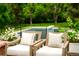 Inviting outdoor patio area with comfortable seating, perfect for relaxing by the pool at 39 Sedgwick Dr, Cherry Hills Village, CO 80113