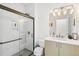 Clean and modern bathroom featuring a white subway tile shower, and a stylish vanity at 421 Saint Paul St, Denver, CO 80206