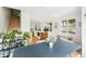Open-concept living space with dining area that opens to a gourmet kitchen at 421 Saint Paul St, Denver, CO 80206