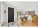 Bright entryway featuring modern design, light wood floors, and stylish decor at 421 Saint Paul St, Denver, CO 80206