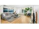 Bright living room with hardwood floors, modern furnishings and abundant natural light at 421 Saint Paul St, Denver, CO 80206