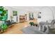 Spacious living room with hardwood floors, lots of natural light, and comfortable seating at 421 Saint Paul St, Denver, CO 80206